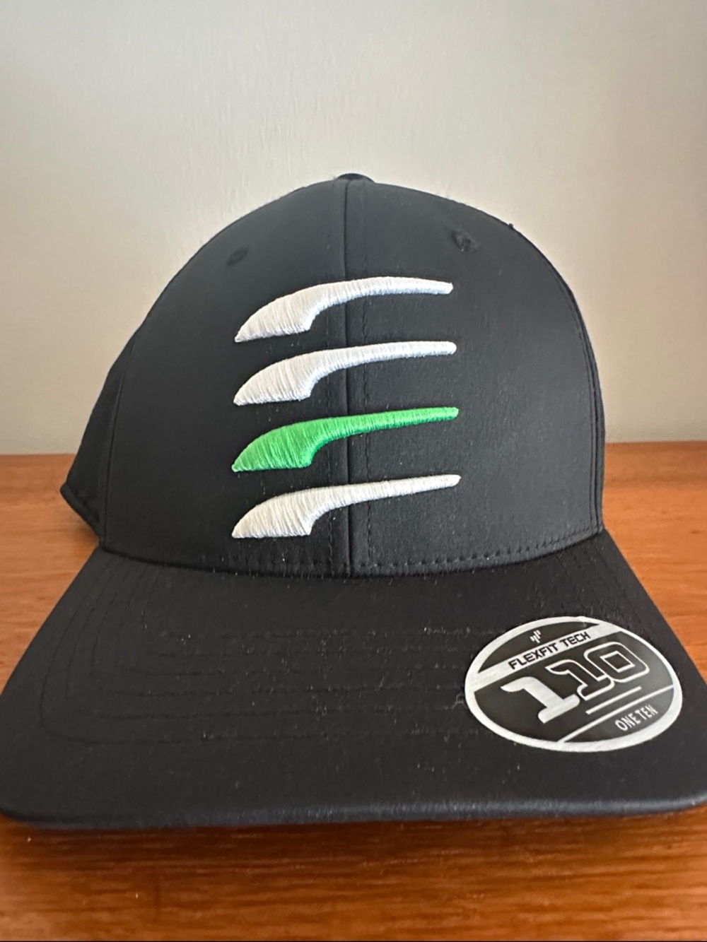 Puma Black Cap with White and Green Logo